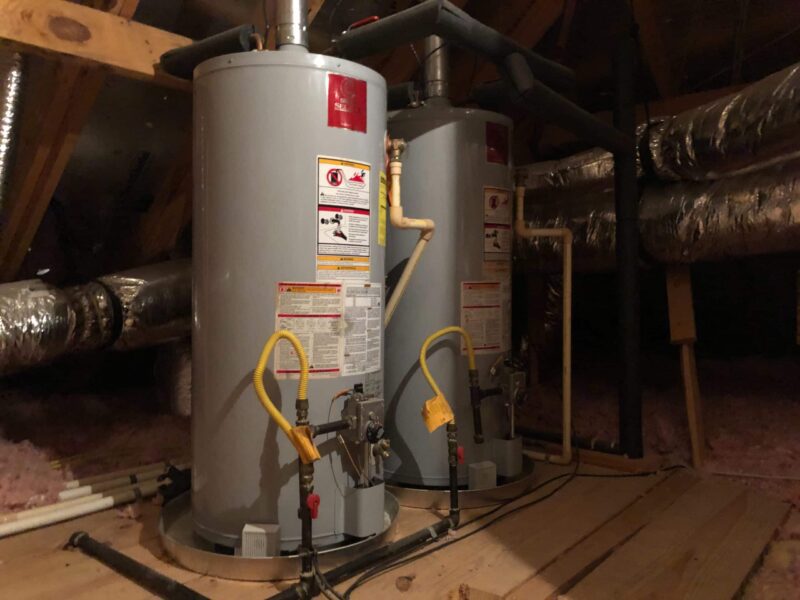 two water heaters side by side in a home