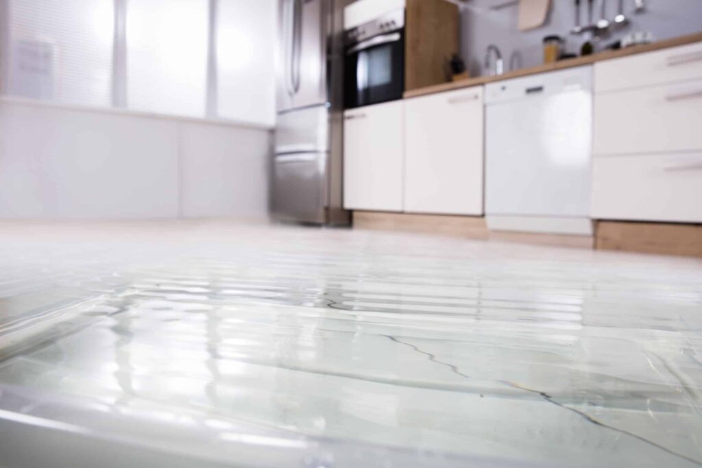 a water leak causing a kitchen floor to flood